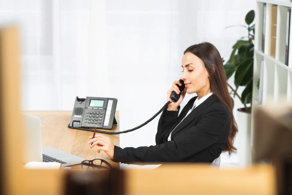 side-view-young-woman-holding-pencil-hand-talking-telephone side-view-young-woman-holding-pencil-hand-talking-telephone